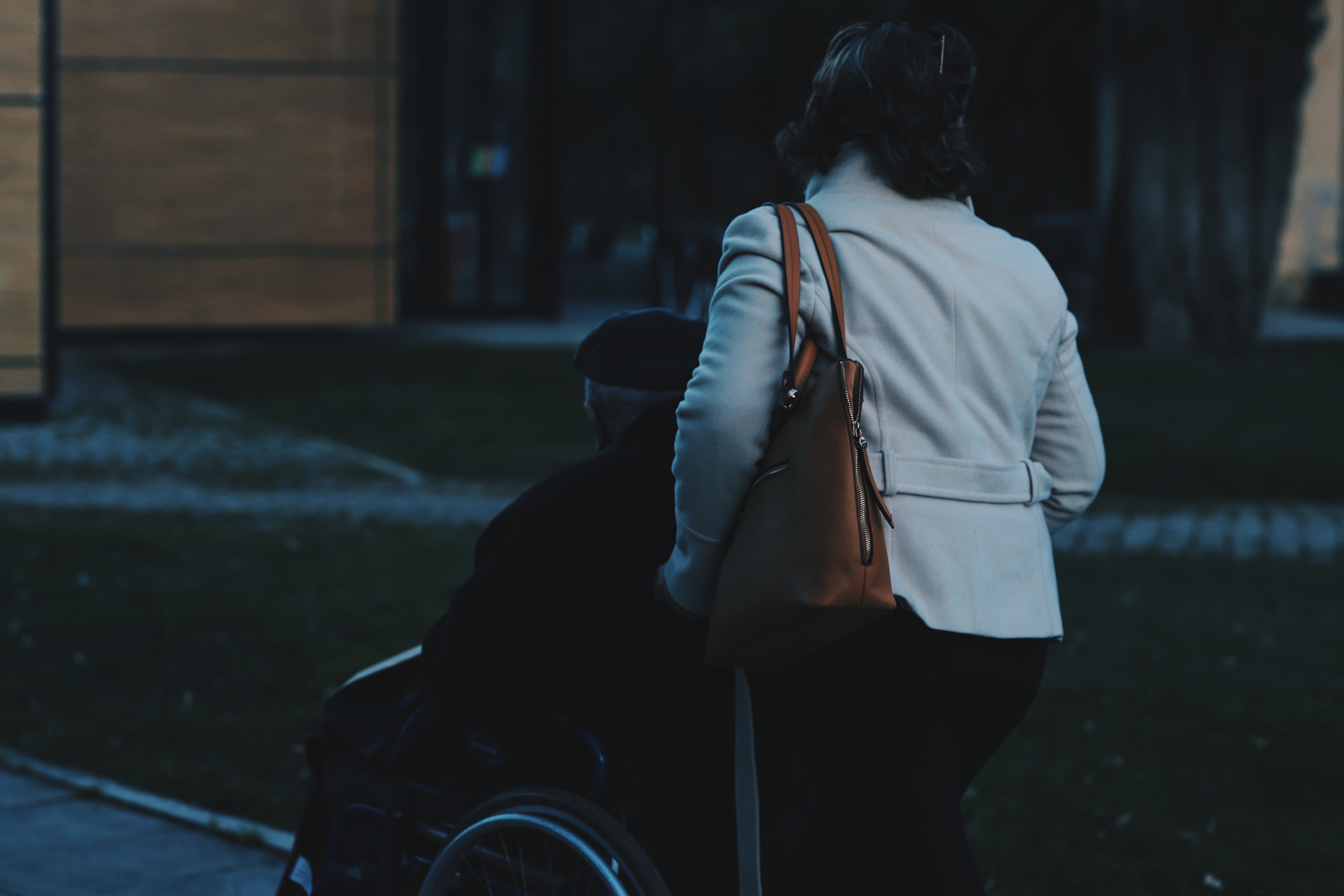 Care worker supporting a younger adult at home